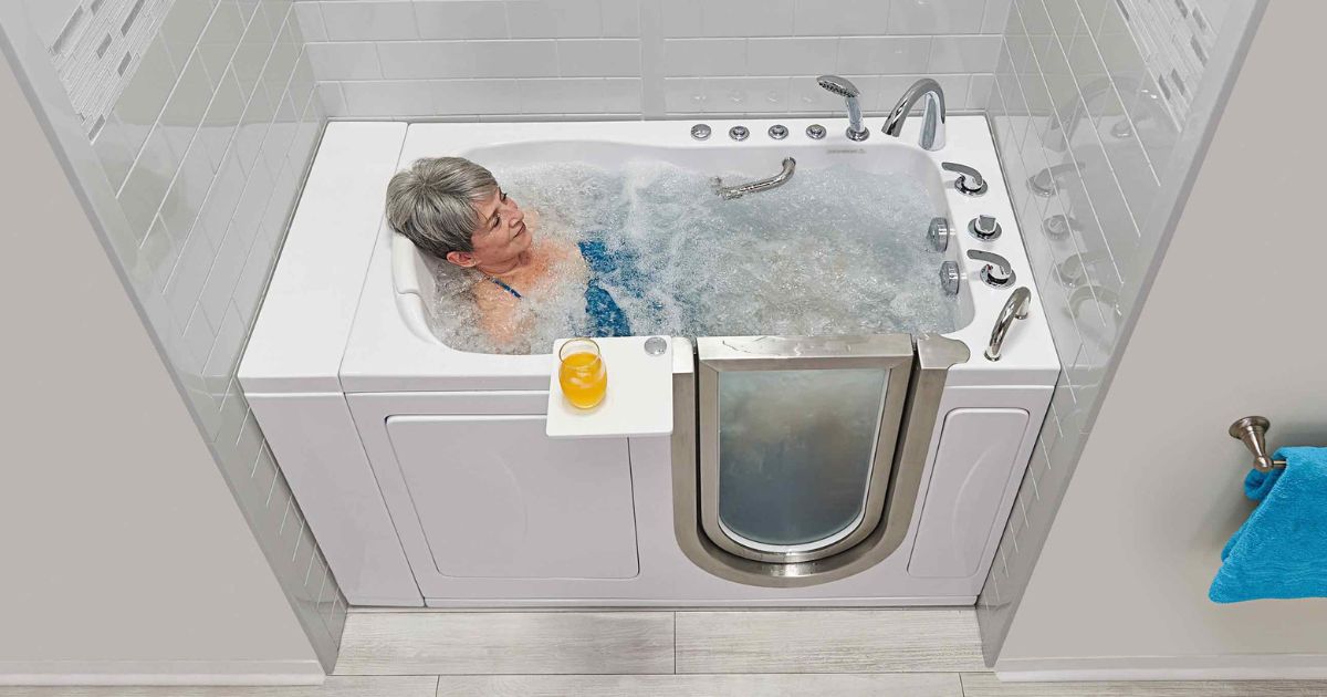 Senior woman in walk-in safety tub